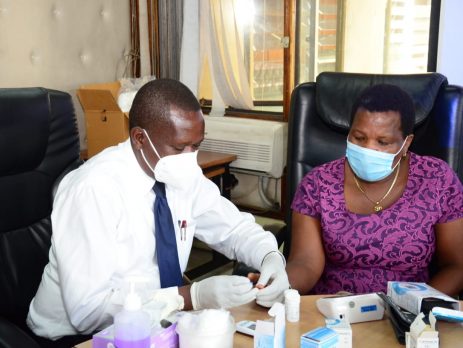 Director, HRM&D, Ms Mary Kemunto, being tested in the Blood Sugar category during the sensitization