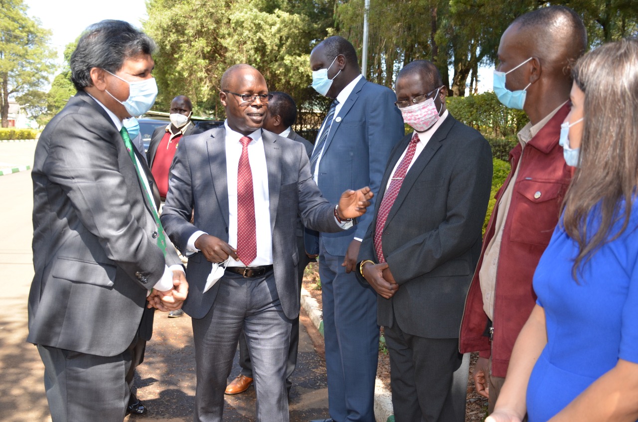 Planning Principal Secretary with Dr. Humpry Njuguna - Chairman of Moi University Council and Board of Rivatex East Africa Limited Prof. Isaac Kosgei - VC Moi University and Prof. Thomas Kipkurgat MD Rivatex East Africa Limited.